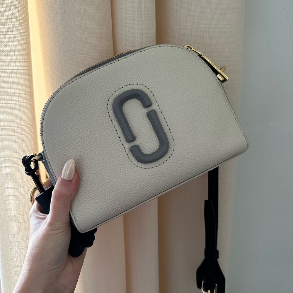 The Marc Jacobs Cream Snapshot Crossbody Bag
